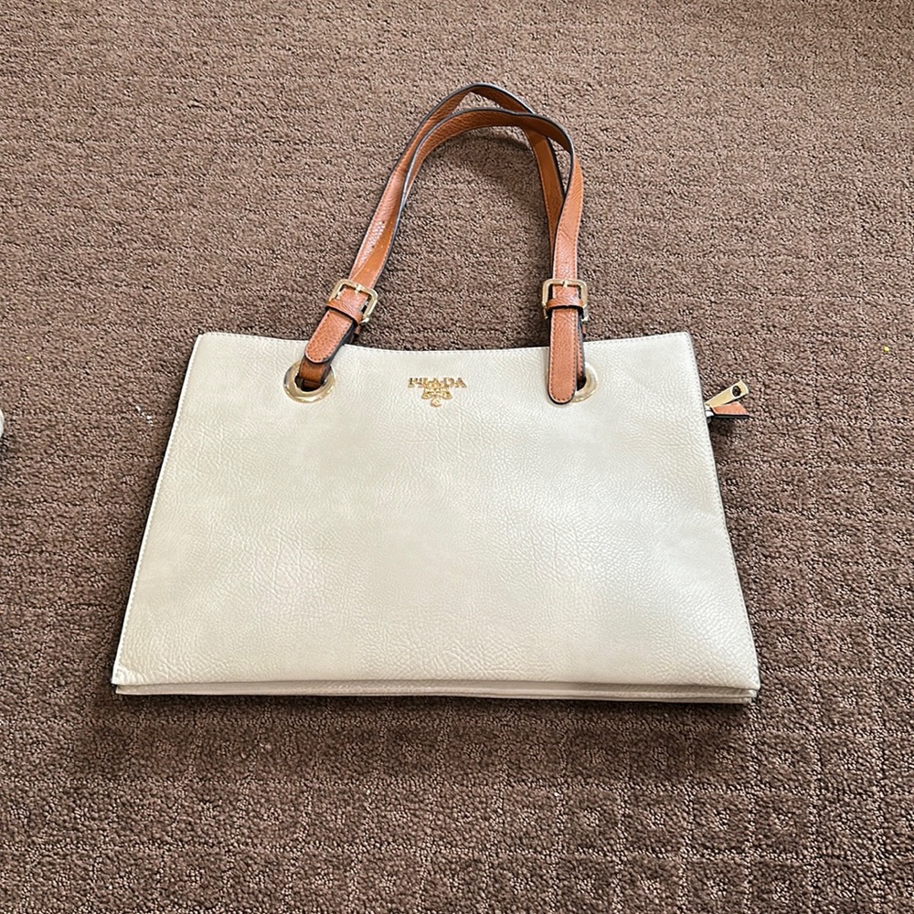 Faux Prada Tan Purse. Never used. Excellent condition.